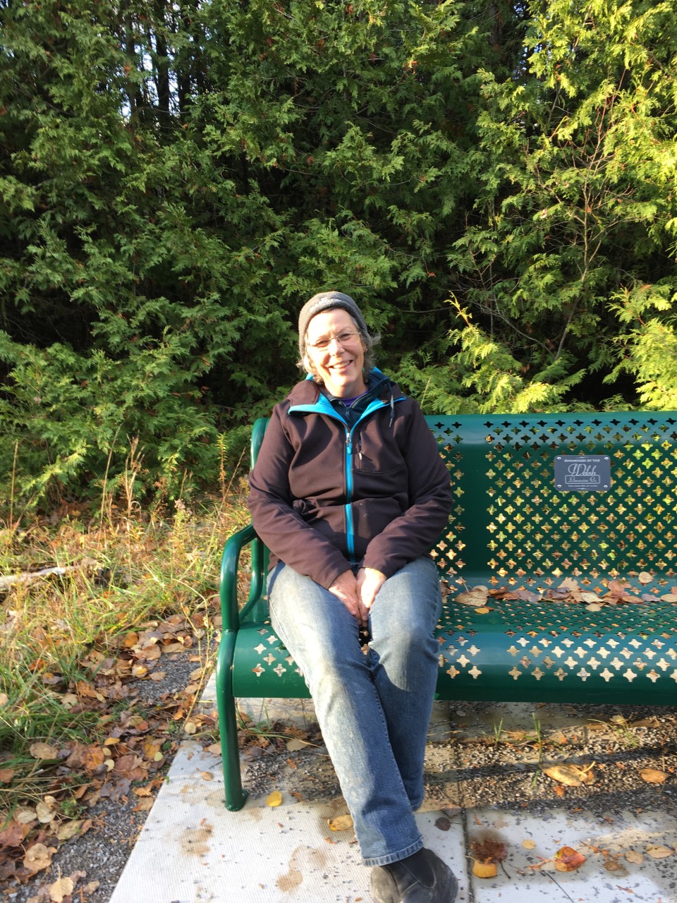 Audrey Keitel sitting on a bench on the Trans Canada Trail.